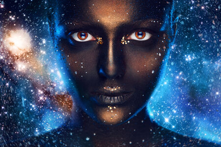 Space make up on female face in studioの写真素材