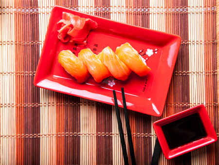 Dinner of sushi with salmon in restaurantの写真素材