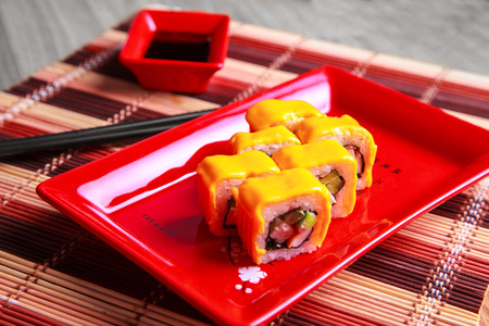 Traditional japanese roll with cheese ontableの写真素材