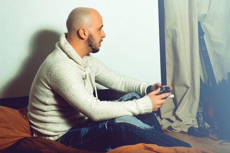 horizontal picture guy playing computer games. concept of leisure entertainment and fun