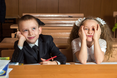 Boy is dreaming about smth and girl is tiredの写真素材