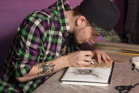 Tatooer is making a mockupの写真素材