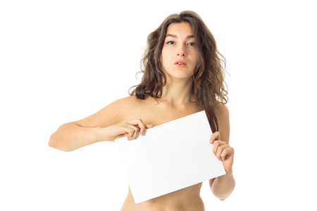 adorable nude brunette girl with placard isolated on white backgroundの写真素材