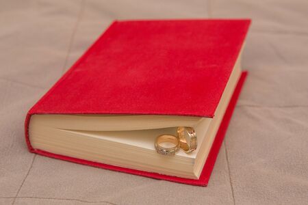wedding rings in the Red Book close upの写真素材