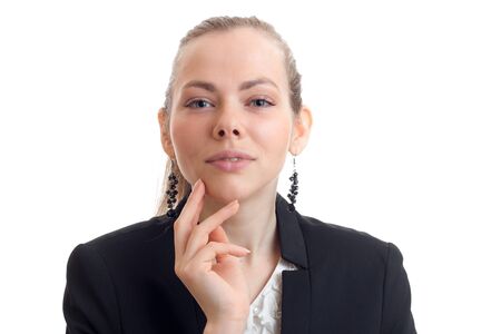 horizontal portrait of attractive young business bondinki which smiles and looks into a camera isolated on white backgroundの写真素材