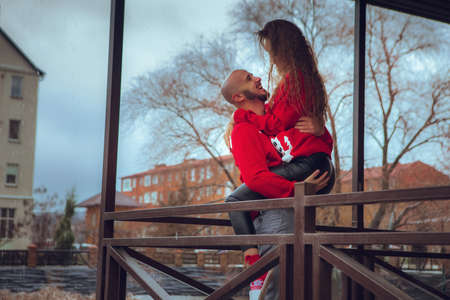 Cheerful family with daughter celebrate New year and Christmas together at homeの写真素材