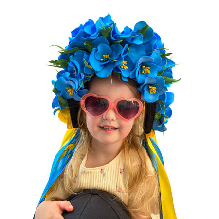 Happy girl posing on camera with blue and yellow wreast isolated on white background. Pray for Urkaine.の写真素材
