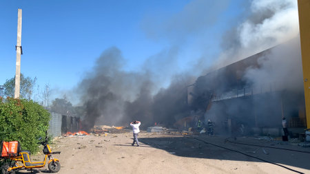 Russian missiles destroyed the factory near the city park. Kremenchug, Ukraine, 27 june 2022のeditorial素材