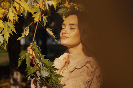 autumn mood beautiful woman portrait outdoorsの写真素材