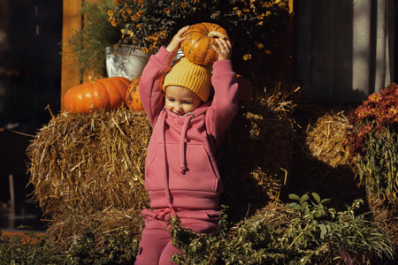 autumn mood little girl portrait outdoorsの写真素材