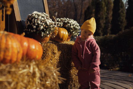 autumn mood little girl portrait outdoorsの写真素材
