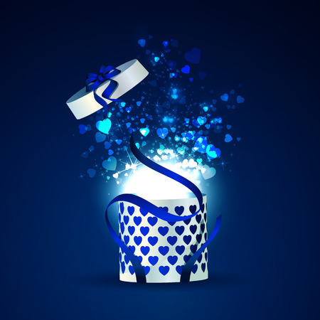 Open gift box with bright rays of light, sparkles and heartsの写真素材