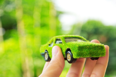 Hand Holding Eco car icon conceptの写真素材