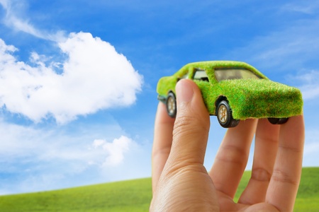  Eco car icon on blue sky backgroundの写真素材