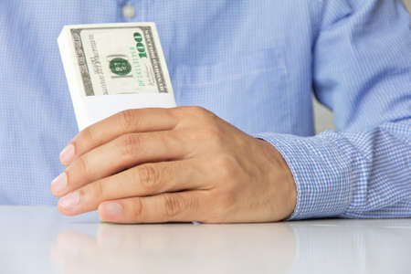 Hand holding money 