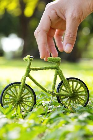Hand Holding Eco Bicycleの写真素材