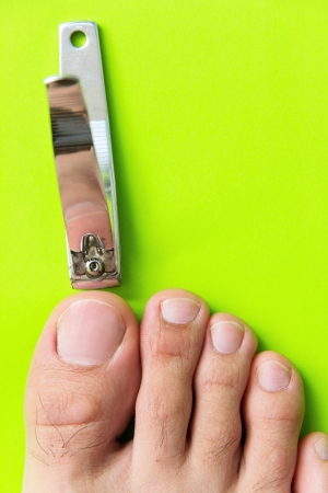 cutting your toenails concept の写真素材