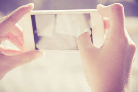 Woman Using a Smart Phoneの写真素材