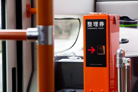 Kawaguchiko, Japan - April 12   A ticket vending machine on the bus  transport for tourists to travel around Lake Kawaguchiko and its surroundings on April 12, 2014 in Kawaguchiko, Japan  のeditorial素材