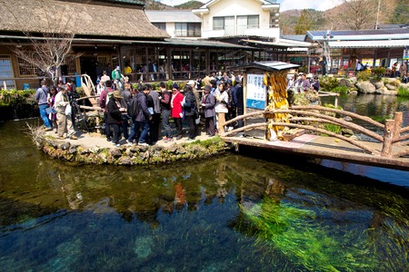Japan - April 13, 2014   Oshino Village and Mount Fuji on April 13, 2014 , Oshino village is a small homestead at the base of Fuji,The village is home to 8 natural spring water poolsのeditorial素材