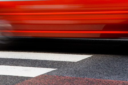 abstract image of taxi with zebra crossing in tokyo on motionの写真素材