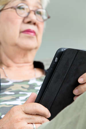 Senior woman with tablet