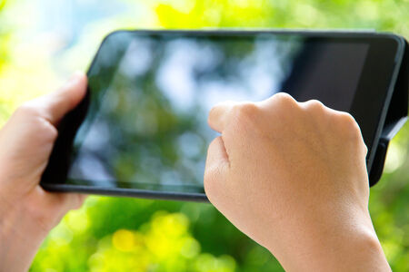 Woman using digital tablet