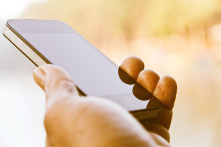 Man Holding a Mobile Phoneの写真素材