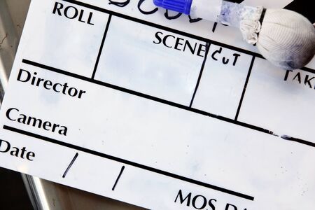 close up image of Film Slate on set