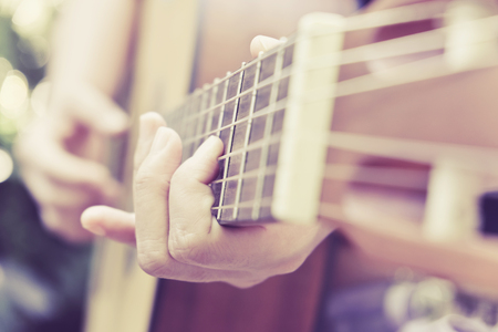 image of playing classic guitar backgroundの写真素材