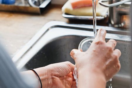 House Work,Close up image of washing dishes.の写真素材