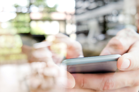 communication technology concept, close up image of people using smart phone
