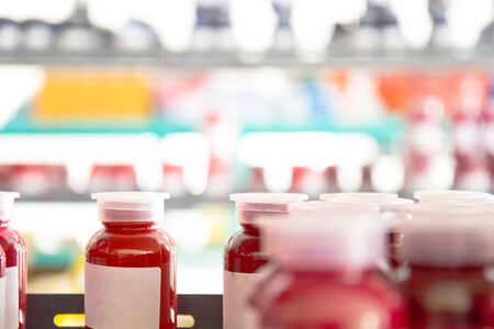 sample color bottle on the shelves in the lab testing room