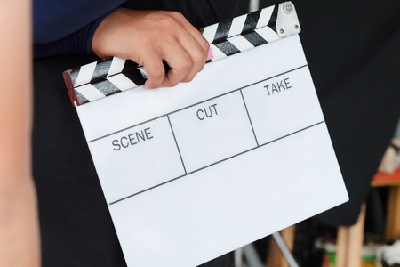 Film Slate, close up image of film production crew holding Film Slate on setの写真素材