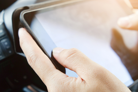 close up image of using digital tablet,Doing business the modern way concept backgroundの写真素材