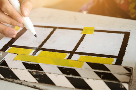 Behind the scene,Film production crew,close up of movie clapperの写真素材