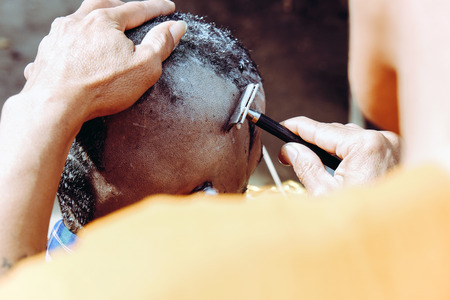 The ceremony of shaving the hair, Buddhist Ordinationの写真素材
