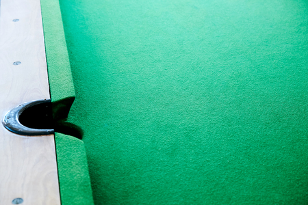 Details of a green pool table