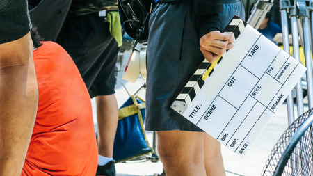 Film production crew, close up of movie Clapper boardの写真素材