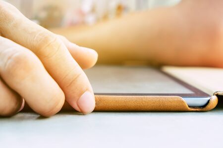 man hands with tablet computerの写真素材