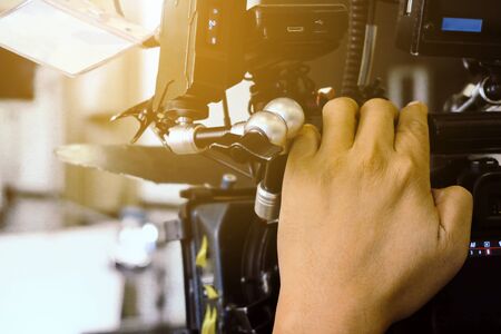 Film industry. cameraman shooting film scene with camera