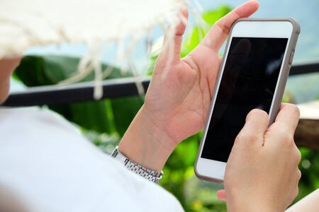Close up image of Woman Using a Smartphone