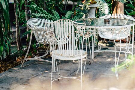Detail of Old vintage furniture in gardenの写真素材
