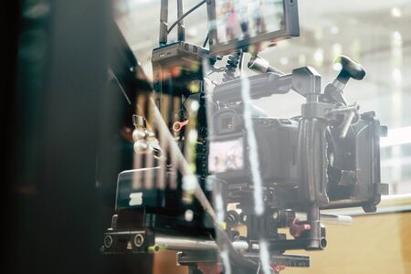 Film industry. Filming with professional camera backgroundの写真素材