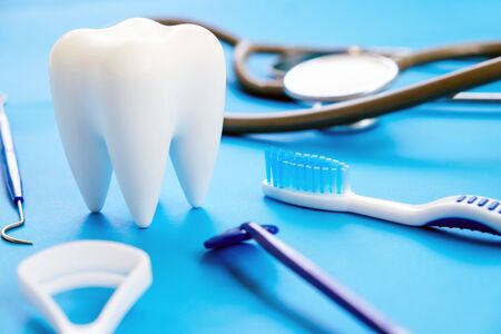 Dental model and dental equipment on blue background, concept image of dental background. dental...