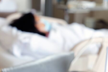 Abstract blur of Elderly patients in hospital bed backgroundの写真素材