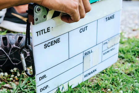 Film Slate, close up image of film production crew holding Film Slate on setの写真素材