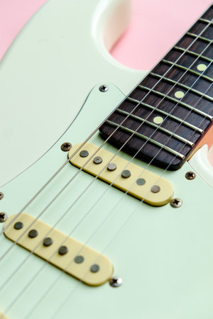 Detail of electric guitar on pinkの写真素材
