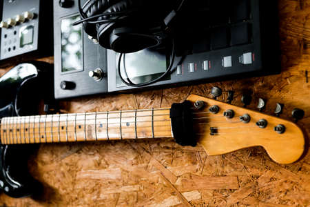 Close up instruments music background concept,Guitar and music studio equipmentの写真素材