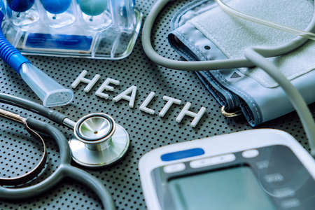 Concept image of Health background, health letters and medical equipment on gray background.の写真素材